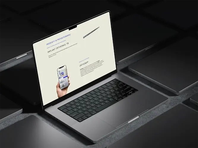 Laptop z otwartą aplikacją webową na ekranie, przedstawiający dedykowane rozwiązania i systemy IT tworzone przez AMETI jako alternatywa dla typowej strony internetowej.